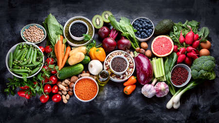 Healthy eating ingredients: vegetables, fruits and legumes. Nutrition, diet, clean food conceptの写真素材