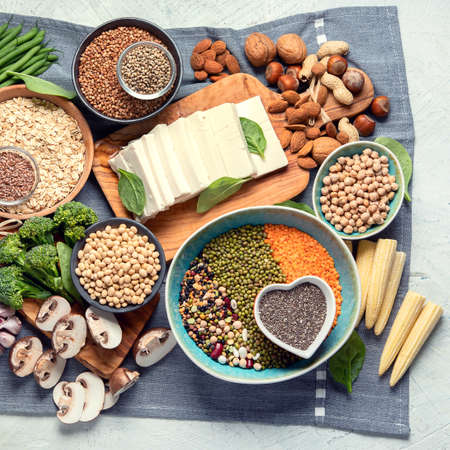 Healthy food for vegans and vegetarian.  Grains, seeds, nuts, vegetables, tofu. Food high in antioxidants, plant protein, dietary fiberの写真素材