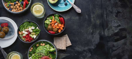 Healthy vegetarian dinner table setting.  Healthy cooking concept. Clean eating, vegan  food. Top view  with copy space. Panorama, bannerの写真素材