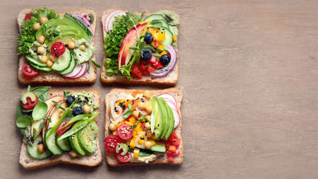 Assortment vegan sandwiches. Plant-based diet. Vegetarian healthy food concept. Clean eating. Top view with copy space.の写真素材