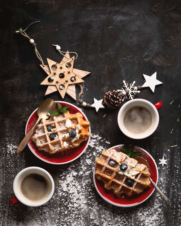 Christmas breakfast with waffles. Top view, flat lay  with copy spaceの写真素材