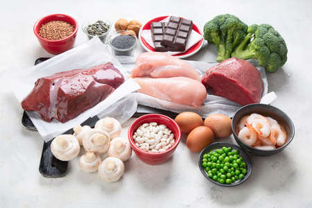 Foods high in Iron for boosts hemoglobin and red blood cell production. Food for healthy pregnancy. Top view with copy spaceの写真素材