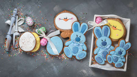 Easter cookies on gray background. Greeting Easter background. Top view with free copy space