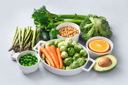 Vegan diet food. Selection of rich fiber sources vegan food.
Foods high in plant based protein, vitamins, minerals, anthocyanins, antioxidants. の写真素材