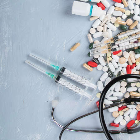 Heap of various Pharmaceutical medicine pills, tablets and capsules. Medical concept. Top view with...