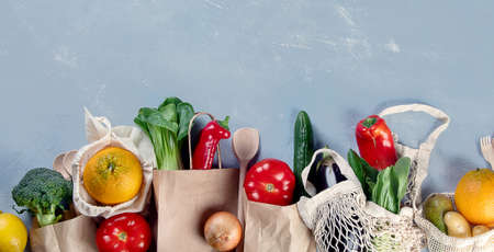 Eco friendly natural bags with organic fruits and vegetables. Zero waste, Plastic free concept. Top...