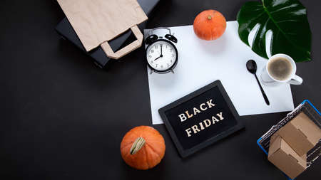 Promotion composition Black friday sale. Black Friday shopping sale concept. Top view, copy space, chalkboard.の写真素材