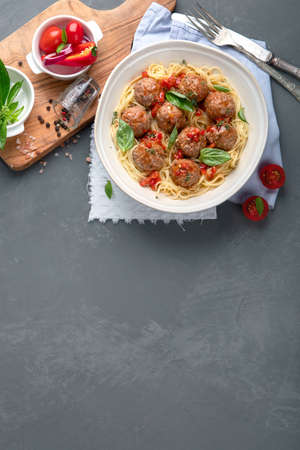 Meatballs with tomato sauce and spaghetti. Authentic Italian recipe. Top view, Copy spaceの写真素材
