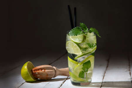 Fresh made Mojito cocktail on dark background. Summer drinks concept. Front view, Copy spaceの写真素材