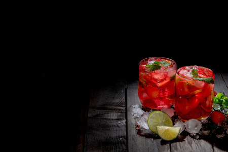 Fresh made strawberry on dark background. Summer drinks concept.の写真素材
