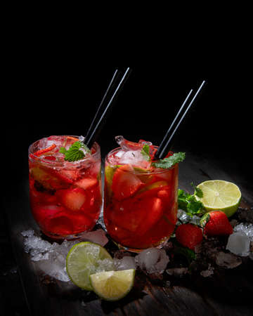 Fresh made strawberry on dark background. Summer drinks concept.の写真素材