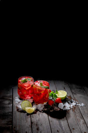 Fresh made strawberry on dark background. Summer drinks concept. Front view, Copy spaceの写真素材