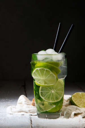 Fresh made Mojito cocktail on dark background. Summer drinks concept. Front view, Copy spaceの写真素材