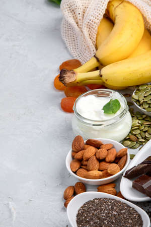 Assortment of products containing magnesium. Healthy diet food. Copy spaceの写真素材