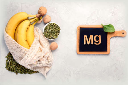 Assortment of products containing magnesium. Healthy diet food. Top view, copy space