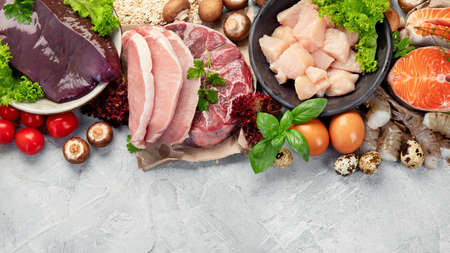 Food high in vitamin B on light gray background. Healthy diet concept. Top view, flat lay, copy spaceの写真素材