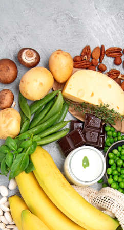 Food high in vitamin B7 on dark background. Healthy diet concept. Top view, flat lay, copy space
