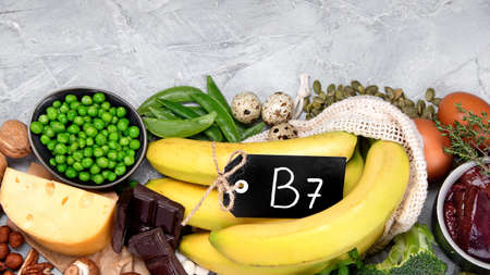 Food high in vitamin B7 on dark background. Healthy diet concept. Top view, flat lay, copy spaceの写真素材