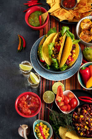 Mexican food, many dishes of the mexican cuisine on dark backgroundの写真素材