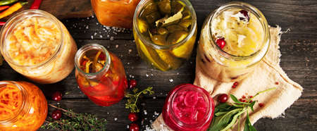 Fermented food on wooden table. High source of probiotics.