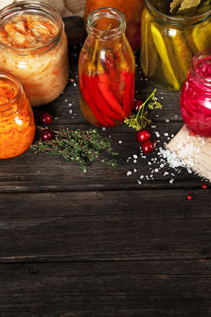 Fermented food on wooden table. High source of probiotics.