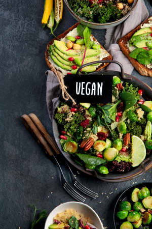 Vegan dishes assortment on gray background. Top view, flat lay, copy spaceの写真素材