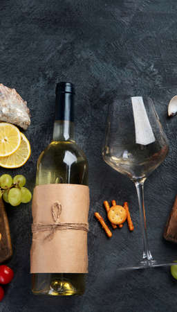 White wine Pinot Grigio with seafood and snacks. Traditional alcohol drinks. Top view, flat lay, copy spaceの写真素材