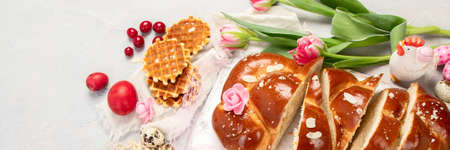 Easter sweet bread, tsoureki cozonac sliced. Easter time, spring time. holiday food concept. Top...
