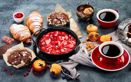 Dessert table with all kinds of cakes and snacks. candy bar. Celebration concept. copy spaceの写真素材