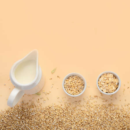 Oats on colorful background. Healthy breakfast. Dieting and weight loss concept. Top view, copy...