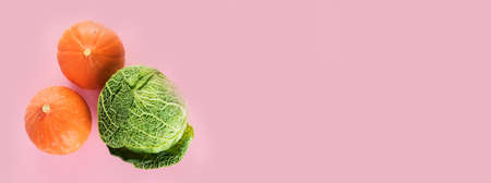 Assortment of vegetables and fruits on colorful background. Detox diet concept. Vegan food. Top view, flat lay, copy space, panoramaの写真素材