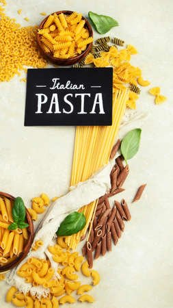 Italian pasta variety on light background. traditional food concept. Flat lay, top view, copy space