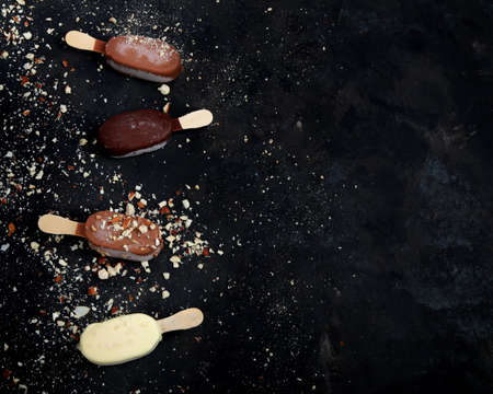 ice-cream assortment on dark background. spring natural background. Top view, flat lay, copy spaceの写真素材