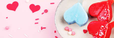 Different type of ice-cream on pink background. Atmospheric summer concept. Top view, flat lay, copy...
