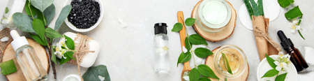 Aloe vera slices and moisturizer on a light background. beauty treatment concept. Top view, flat...