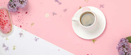 Composition with cup of coffee on color background. spring natural background. Top view, flat lay,...