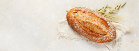 Bread assortment on neutral background. Fresh homemade pastry. Top view, copy space, panorama