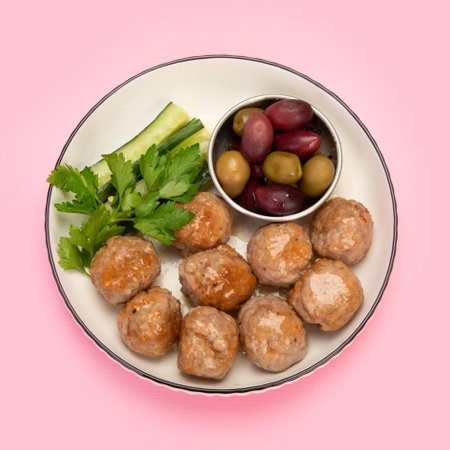 Greek meatballs keftedes on color background. Traditional food. creative photo concept. top view, copy spaceの写真素材
