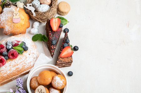 Easter dessert table. Sweet easter holiday concept with holiday decorations. top view, copy spaceの写真素材
