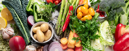 Healthy food clean eating selection: fruit, vegetable, seeds, superfood, cereal, leaf vegetable on a white background. top view. Panorama banner.の写真素材