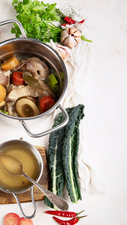 Beef broth of beef meat on slow bones cooked with vegetables: carrot, onion, garlic, and spices...
