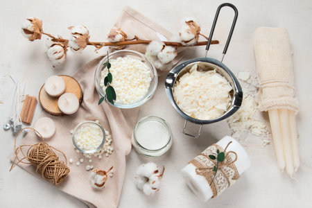 A set for homemade candles made of various types of wax and wicks. Idea for a hobby, business. Making fashionable candles with your own hands.の写真素材