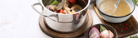 Beef broth of beef meat on slow bones cooked with vegetables: carrot, onion, garlic, and spices...