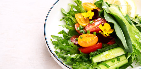 Spring vegetable salad. Tasty healthy food. top view, copy space