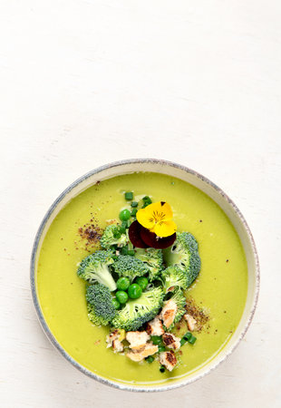 green soup. Broccoli cream soup. Healthy vegan dish. top view, copy spaceの写真素材