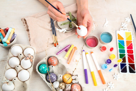 DIY Easter egg painting. Holidays and creativity. Tradition concept.の写真素材