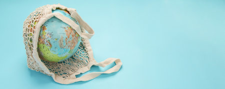 globe on blue background. Environment protection. Top view, copy space, Panorama, banner