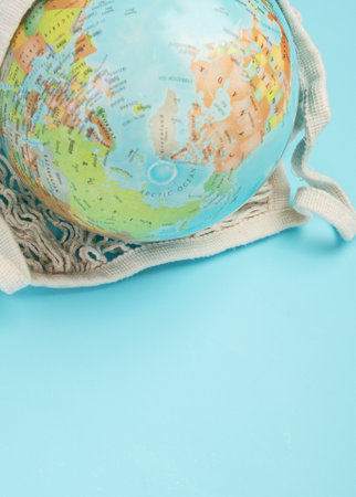 Globe on blue background. Environment protection. Top viewの写真素材