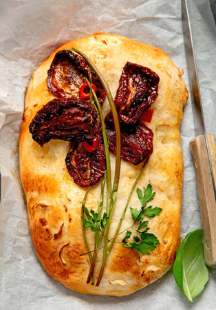 Focaccia art. Italian bread on dark background. Top viewの写真素材