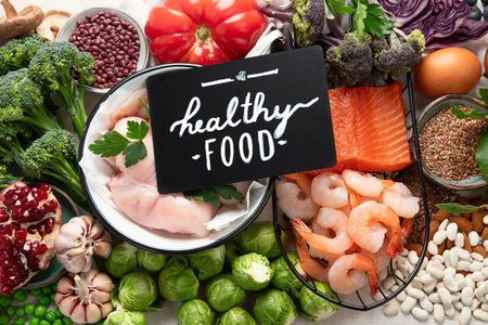Balanced diet food background. Healthy food selection. Detox and clean diet concept. Foods high in vitamins, minerals and antioxidants. Anti age foods. Top view.の写真素材